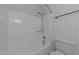 Bright bathroom featuring a white shower-tub combination and a white toilet at 109 Virginia Pl, Cary, NC 27513