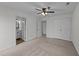Spacious bedroom with neutral carpet and ensuite bathroom at 109 Virginia Pl, Cary, NC 27513