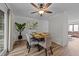 Open concept dining room with decorative ceiling fan and natural light at 109 Virginia Pl, Cary, NC 27513
