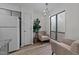 Bright eat-in kitchen with modern lighting and adjacent sitting area at 109 Virginia Pl, Cary, NC 27513