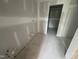 Unfinished bathroom with plumbing fixtures and drywall at 11147 Salers Loop, Middlesex, NC 27557