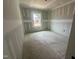 View of a new construction bedroom with a single window looking out onto the property at 11147 Salers Loop, Middlesex, NC 27557