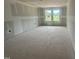 An unfinished bedroom featuring ample natural light through the double windows at 11147 Salers Loop, Middlesex, NC 27557