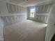 Spacious bedroom featuring a large window, perfect for natural light at 11147 Salers Loop, Middlesex, NC 27557