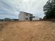 New home with siding and a spacious backyard, offering a blend of modern style and outdoor living at 11147 Salers Loop, Middlesex, NC 27557