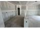 Kitchen in a new construction home. View into the kitchen with covered walls and floors at 11147 Salers Loop, Middlesex, NC 27557