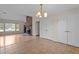 Living room showcases a brick fireplace, wood floors, and windows that provide natural light at 1131 Pulley Gordon Rd, Zebulon, NC 27597
