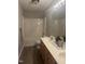 Functional bathroom with dual vanity, tile flooring, and shower-tub combo, perfect for everyday use at 12 Linsey Ct, Lillington, NC 27546