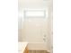 Clean bathroom featuring an alcove tub, neutral wall color and updated fixtures at 12 Linsey Ct, Lillington, NC 27546