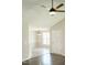 Inviting entryway with wood flooring and a view into the dining area with bright natural light at 12 Linsey Ct, Lillington, NC 27546