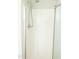 Bright shower with mounted and handheld showerheads, perfect for a modern bathroom at 12 Linsey Ct, Lillington, NC 27546