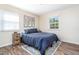 Serene bedroom featuring a comfortable bed, soft lighting, and tasteful decor, creating a peaceful retreat at 1208 W Murray Ave, Durham, NC 27704