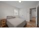 Cozy bedroom with laminate flooring, double closets, and neutral decor, a comfortable retreat at 1208 W Murray Ave, Durham, NC 27704