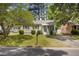 A cozy one-story home with tidy landscaping and a classic mailbox at 1208 W Murray Ave, Durham, NC 27704