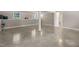 Open basement featuring concrete floors and ample natural light at 1220 Sherbrooke Ct, Raleigh, NC 27612