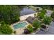 Aerial view of community pool, beach, and lake amenities at 1231 Silver Beach Way, Raleigh, NC 27606