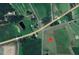 Aerial view reveals the property's location at the intersection of Parkertown Road and Parker Road at 1301 Parkertown Rd, Four Oaks, NC 27524
