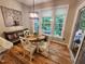 Cozy breakfast nook with natural light, table, and slider access to patio at 1309 Bartlett Cir, Hillsborough, NC 27278