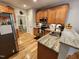 Well-equipped kitchen with stainless steel appliances, wood cabinets, and granite countertops at 1309 Bartlett Cir, Hillsborough, NC 27278
