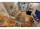 Bright, spacious living room with hardwood floors, comfortable seating, and a fireplace focal point at 1309 Bartlett Cir, Hillsborough, NC 27278