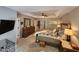 Spacious main bedroom boasts a tray ceiling and neutral paint at 1309 Bartlett Cir, Hillsborough, NC 27278