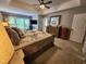 Open main bedroom features ceiling fan, natural light, and neutral paint at 1309 Bartlett Cir, Hillsborough, NC 27278