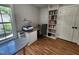 Bright office with built-in desk and shelving at 1309 Bartlett Cir, Hillsborough, NC 27278