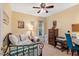 Bedroom featuring decor, ceiling fan, and double windows at 135 Crooked Creek Run, Louisburg, NC 27549