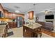 This beautiful kitchen has granite counters, stainless steel appliances, and wood cabinets at 138 Tramway Cir, Angier, NC 27501
