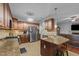 Spacious kitchen boasts granite counters, stainless appliances, and ample cabinet space for storage at 138 Tramway Cir, Angier, NC 27501