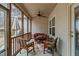 Enjoy relaxing on this cozy screened porch with comfortable outdoor seating at 138 Tramway Cir, Angier, NC 27501