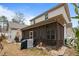 Back exterior of home featuring a screened porch at 138 Tramway Cir, Angier, NC 27501