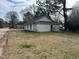 Rear exterior view of a renovated home with a street view at 1400 Hargrove St, Rocky Mount, NC 27801