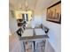 Spacious dining area with seating for six offers a perfect blend of style and functionality with backyard view at 141 Jones Franklin Rd # E, Raleigh, NC 27606