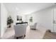 Inviting office featuring neutral tones, plush carpet, a modern desk, and comfortable seating with great light at 1437 Newpoint Dr, Durham, NC 27713