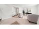 Bright office space with plush carpet, featuring neutral-toned walls, a modern desk, and comfortable seating at 1437 Newpoint Dr, Durham, NC 27713