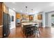 Spacious kitchen with wooden cabinets, stainless steel appliances and granite countertops at 1612 Rainesview Ln, Apex, NC 27502