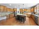 Spacious kitchen with wooden cabinets, stainless steel appliances and granite countertops at 1612 Rainesview Ln, Apex, NC 27502