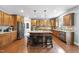 Spacious kitchen with wooden cabinets, stainless steel appliances and granite countertops at 1612 Rainesview Ln, Apex, NC 27502