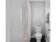Cozy bathroom featuring a toilet and shower with patterned curtain at 1637 Dodford Ct, Wake Forest, NC 27587