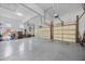 Spacious three car garage featuring high ceilings and ample storage space at 1637 Dodford Ct, Wake Forest, NC 27587