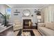 Inviting living room featuring a fireplace, stylish decor, and comfortable seating at 1637 Dodford Ct, Wake Forest, NC 27587