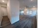 A long hallway leads into an open living room, dining and kitchen area at 179 New Twin Branch Ct, Smithfield, NC 27577