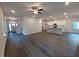 A living room, dining area and kitchen offer an open floor plan and hardwood floors at 179 New Twin Branch Ct, Smithfield, NC 27577