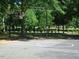 Community basketball court surrounded by lush greenery and trees at 192 Summerwalk Cir, Chapel Hill, NC 27517