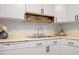 Kitchen sink and counter space with decor, plus plenty of lighting, complete with dishwasher at 192 Summerwalk Cir, Chapel Hill, NC 27517