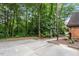 Dedicated parking lot surrounded by mature trees at 192 Summerwalk Cir, Chapel Hill, NC 27517