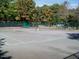 Well-maintained tennis court within the community at 192 Summerwalk Cir, Chapel Hill, NC 27517