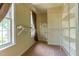 Expansive walk-in closet with shelving, carpet and a window at 1937 Crag Burn Ln, Raleigh, NC 27604