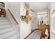 Bright hallway with staircase, decor, and hardwood floors at 20007 Bragg, Chapel Hill, NC 27517